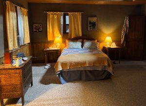 A shot of a cozy, dimly lit bedroom